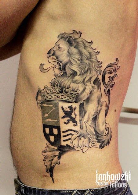 lion tattoo | Crest tattoo, Family crest tattoo, Lion tattoo