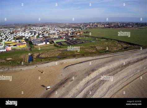 Selsey Beach with the popular holiday caravan park in the background ...