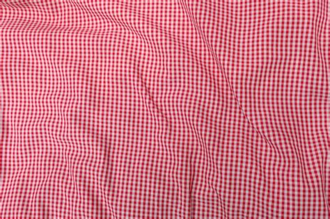 Premium Photo | Red classic checkered tablecloth texture