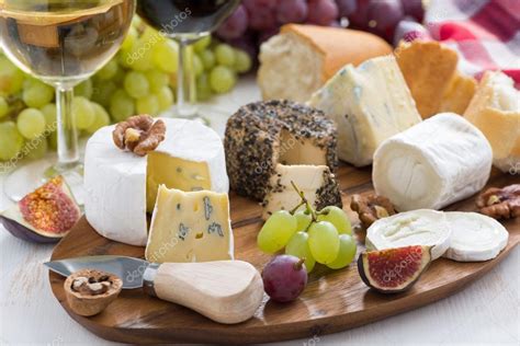 Cheese platter, snacks and wine Stock Photo by ©cook_inspire 56642531