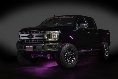 Lifted Custom Ford F-150 4x4 Truck with Custom Led Lighting in Black with Pink Accents