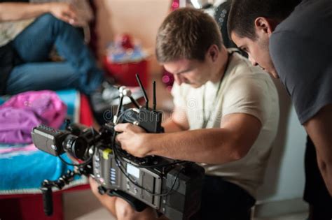 Behind the Scene. Cameraman with His Camera on Outdoor Set Stock Photo ...