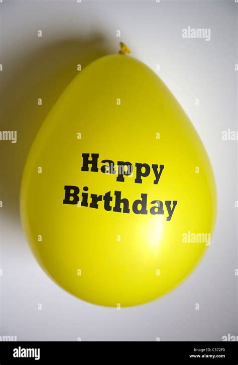 Yellow happy Birthday Balloon Stock Photo - Alamy