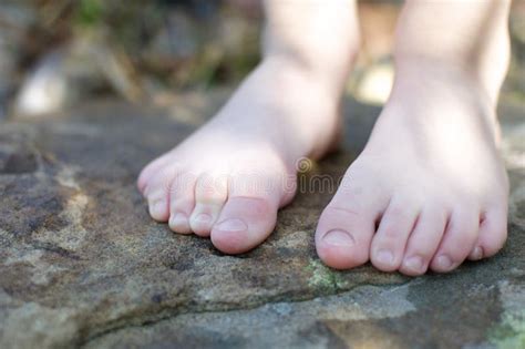 Little Bare Feet stock photo. Image of little, moss, cute - 18974952