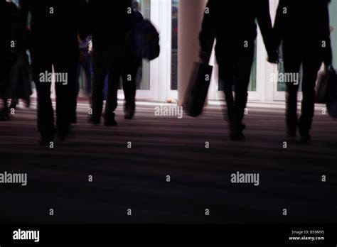 crowd of people walking in street at night Stock Photo - Alamy