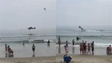 Banner Plane Crashes Into Water At Crowded Beach