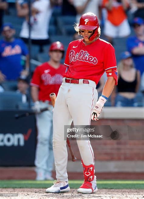 Alec Bohm of the Philadelphia Phillies reacts after striking out to ...