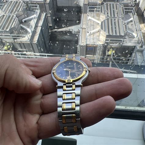 Men’s Gucci gold/silver watch Watch needs new battery - Depop