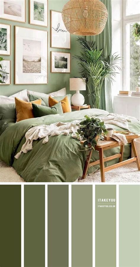 a bedroom with green walls and pictures on the wall