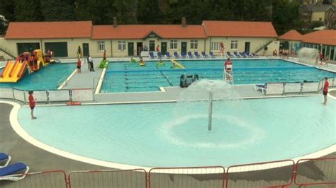 Free swimming as revamped Pontypridd lido opens - BBC News