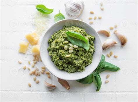 Green basil pesto 14887175 Stock Photo at Vecteezy