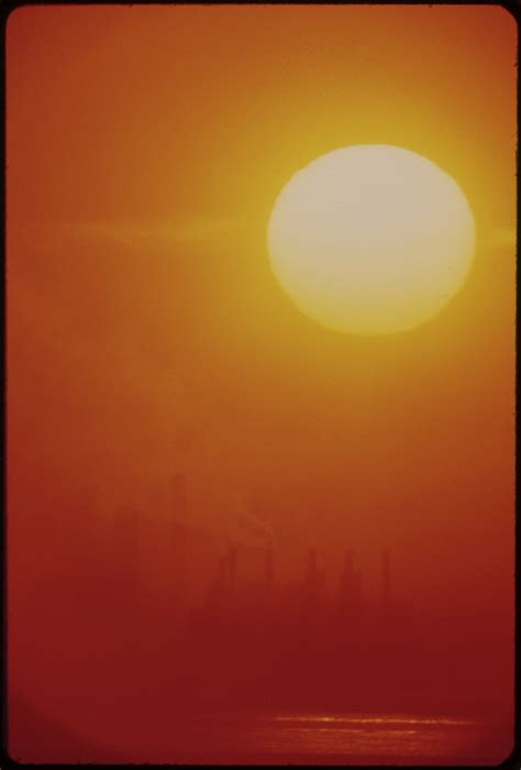 File:SMOG MAKES DISTORTING LENS FOR THE RISING SUN AND OBSCURES THE CLEVELAND SKYLINE - NARA ...