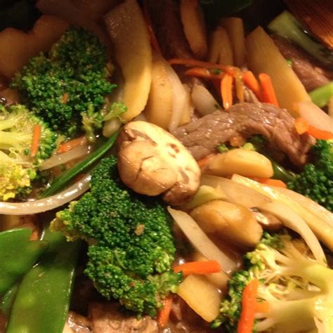 Dinner - flank steak stir fried with broccoli, bamboo shoots, snow peas, carrots, onions, and ...