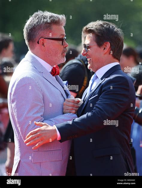 Christopher McQuarrie (L) and Tom Cruise attend the world premiere of ...