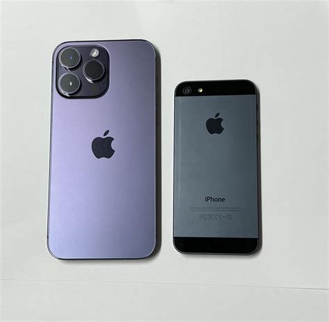 14 pro max deep purple vs iPhone 5 black. Found my old iPhone 5 that was somewhere in the closet ...