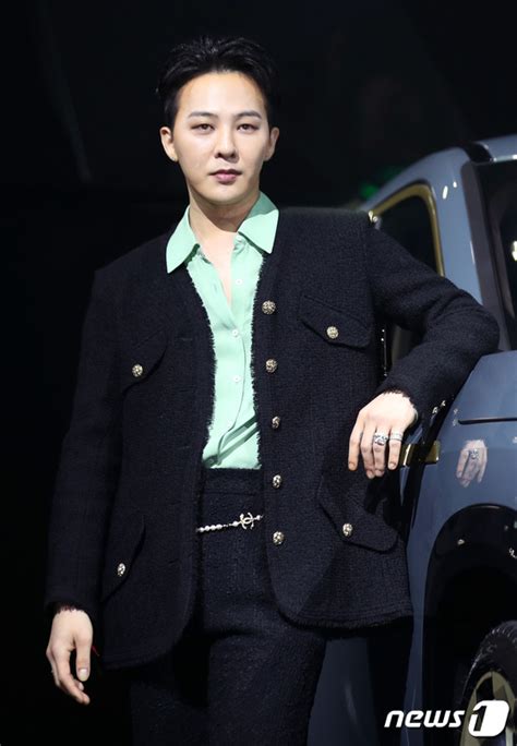 G-Dragon Poses At the 'BMW New XM' Launch Event | KpopStarz