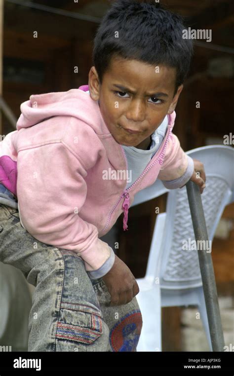 Young indian boy making funny faces pretending to be a policeman. India ...