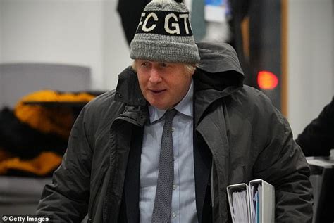 Why does Boris Johnson keep wearing a GTFC hat and what does it mean ...