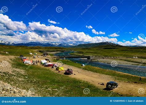 Camping stock image. Image of greenery, clouds, lake - 125859945