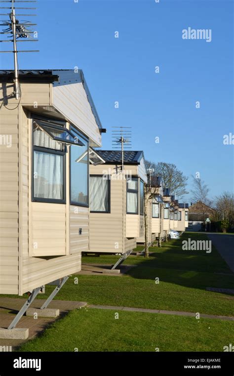 A row of caravans in a Caravan Park in Silloth, Cumbria, England Stock ...