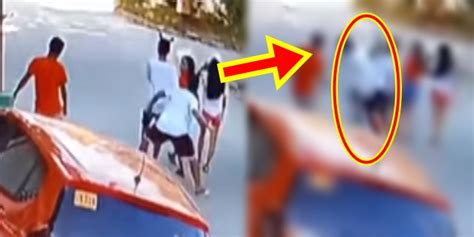 Caught On CCTV: Two Men Beating Young Man In Street