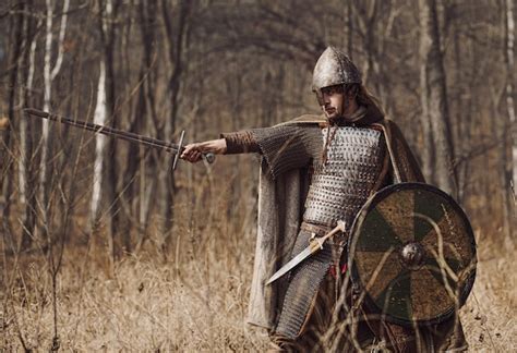 Premium Photo | Men in russian panoply fighting in forest