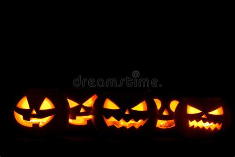 Halloween Pumpkins On Black Stock Photo - Image of glow, isolated ...