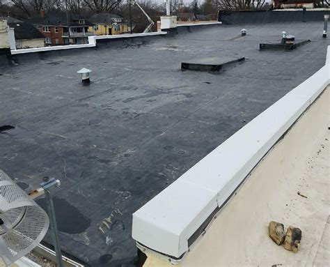 Is it Time to Replace your Flat Roof? - VDB Contractors