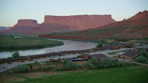 5.5K stock footage aerial video of approaching Red Cliffs Lodge by the Colorado River, Moab ...