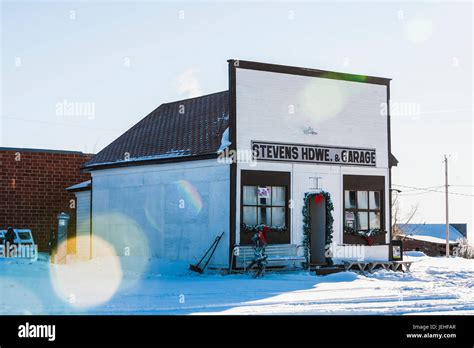 A shop and garage in the Alberta prairies in winter; Orion, Alberta ...