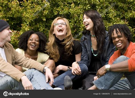 Diverse group of people talking and laughing. Stock Photo by ...