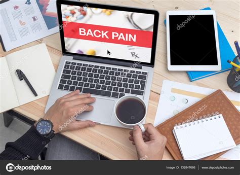 BACK PAIN CONCEPT ON LAPTOP — Stock Photo © garagestock #132847666