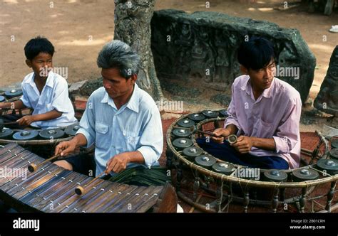 Cambodia: A pinpeat or traditional Khmer musical ensemble, Ta Prohm temple near Tonle Bati ...