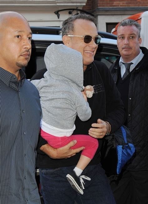 Tom Hanks Holds His Grandson Close | Celeb Baby Laundry