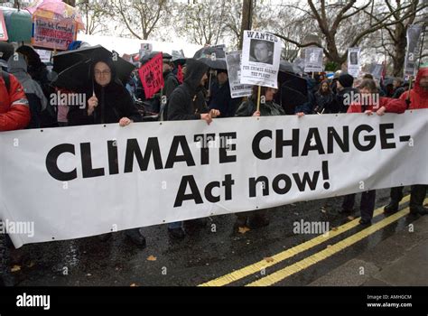 "Climate Change Act Now!" protestors banner Climate Change march London ...