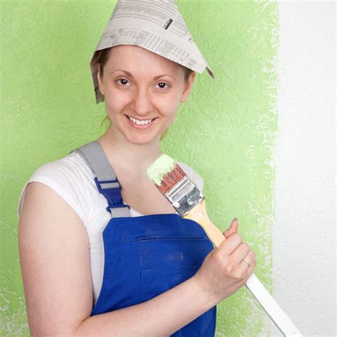 Young Female Painter with Paintbrush Stock Image - Image of worker, improvement: 33525235