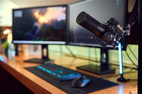 Gaming Computer Setup on Desk at Home with Microphone and Multiple ...