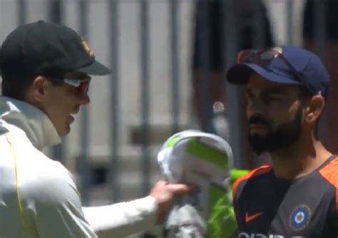 WATCH: This 'frosty' handshake between Virat Kohli and Tim Paine has ...