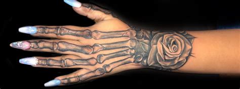 Skull Hand Tattoos For Men