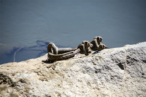 Boat Anchor In A Rock Free Stock Photo - Public Domain Pictures