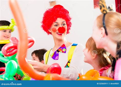 Clown at Children Birthday Party with Kids Stock Image - Image of kids, decoration: 52565911