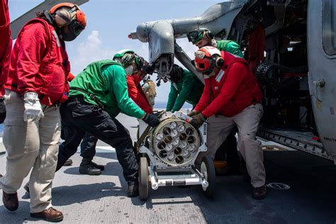 DVIDS - Images - USS America (LHA 6) Conducts Missile Onload [Image 3 of 6]