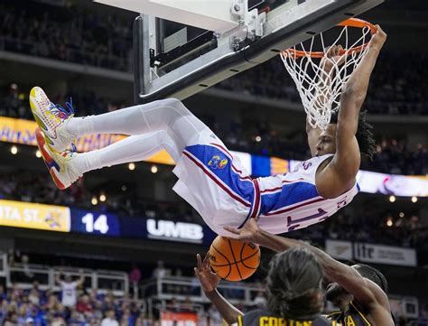 Hunter Dickinson helps No. 2 Kansas roll past Wichita State