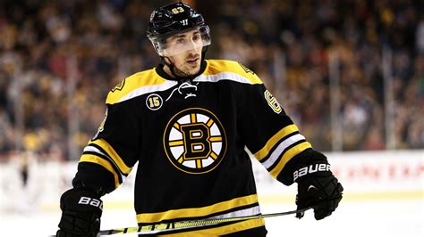 Bruins' Marchand leaves first period after hit, returns to score ...