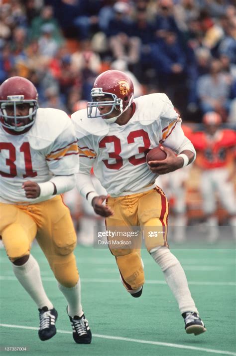 Marcus Allen of the USC Trojans runs during an NCAA football game ...