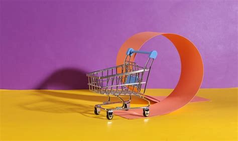 Premium Photo | Shopping cart on creative minimalistic background