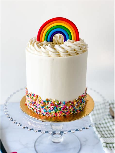 How to Make a Rainbow Surprise Layered Cake - XO, Katie Rosario