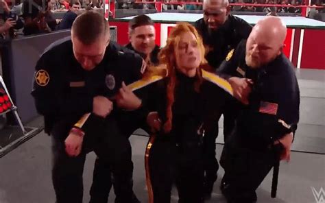 Watch Becky Lynch Get Arrested For Attacking Ronda Rousey On WWE RAW