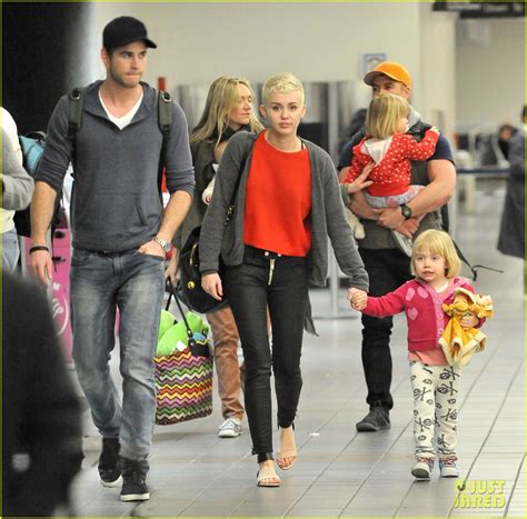 Full Sized Photo of miley cyrus liam hemsworth take flight with the ...