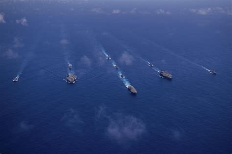 Nimitz Carrier Strike Group and Reagan Carrier Strike Group sail in formation with JMSDF and ...